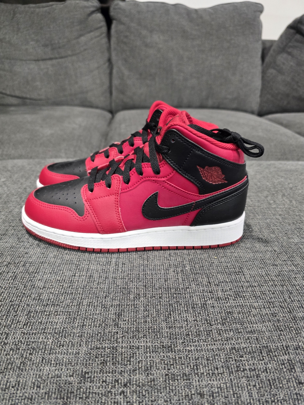 Jordan Kids High-Top Athletic Shoes in Red and Black